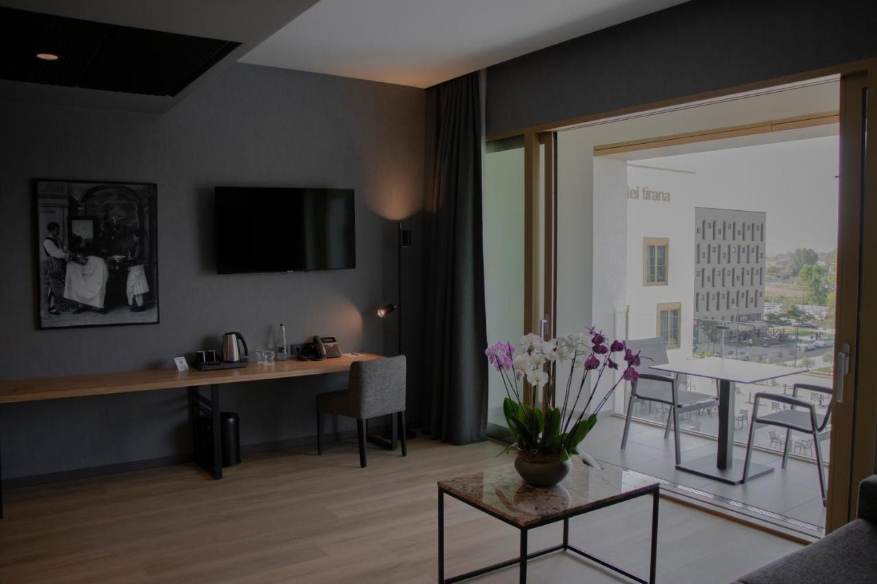 Mk Hotel Tirana Rinas المظهر الخارجي الصورة A room at the hotel